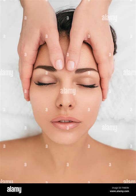 Young Woman Getting Head Massaged At A Beauty Spa Relax With Head