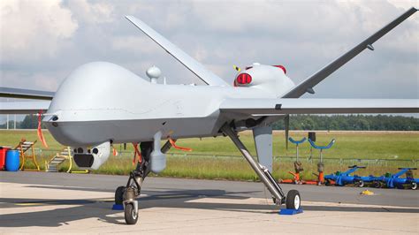 it s official contractor owned mq 9 reaper drones will watch over