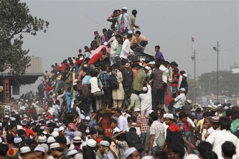 thousands of bangladeshi muslim pilgrims try to get on a crowded train