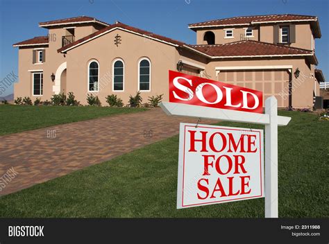 sold home sale sign front  house image photo bigstock