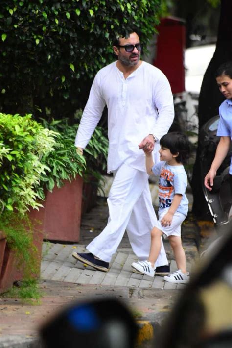 saif ali khan kareena kapoor step out for a walk with son taimur see