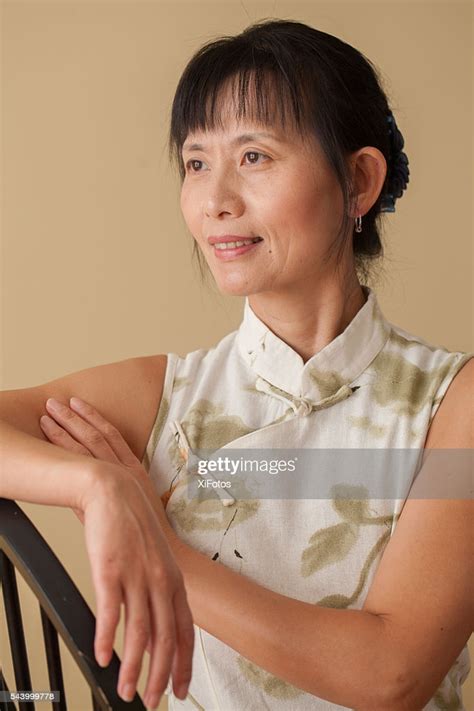 Mature Chinese Woman In Traditional Dress Qipao High Res