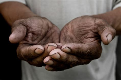 the poor old mans hands beg you for help the concept of hunger or