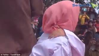 indonesian woman lashed in brutal sharia law punishment