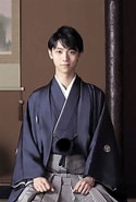 Image result for Young men wrapped up in popularity of traditional Japanese clothing. Size: 125 x 185. Source: cobasaigonjp.com