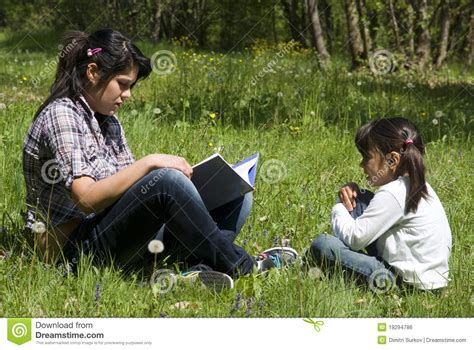 sisters reading book together royalty free stock image image 19294786