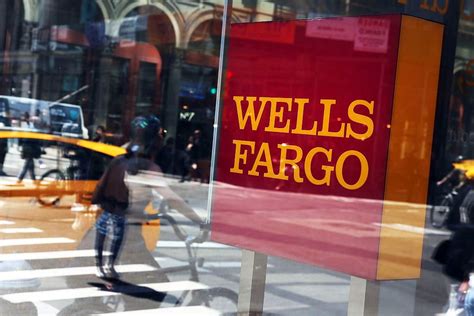 Wells Fargo Fourth Quarter Profit Drops 50 As Legal Fees Low Interest