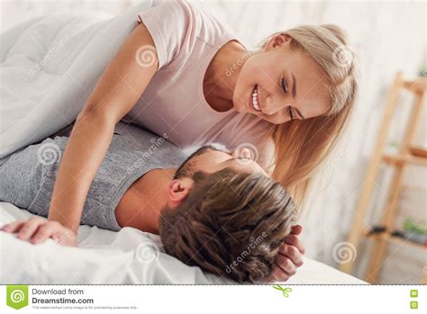 Cute Loving Couple Luxuriating In Bedroom Stock Image Image Of Female