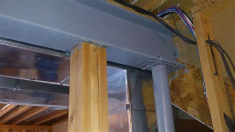 structural    columns holding   support beam home
