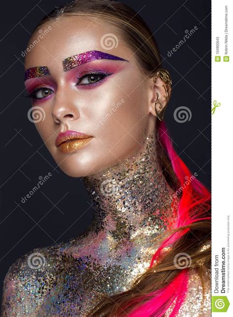 Beautiful Girl With Creative Glitter Makeup Sparkles Unusual Eyebrows