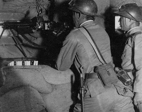 photo japanese type  machine gun  crew   bunker date unknown