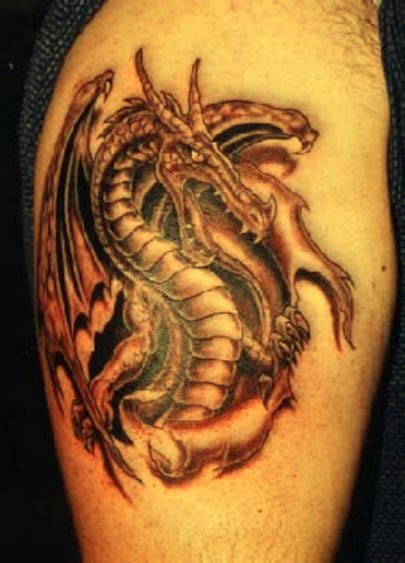 29 3d Dragon Tattoo Biting Arm Of Ideas Dragon Tattoo 3d Dragon