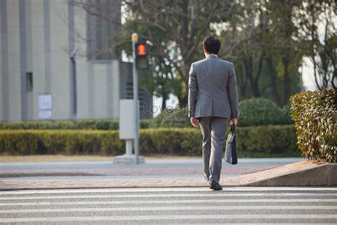 Back View Of Business Man Walking On The Sidewalk Picture And Hd Photos