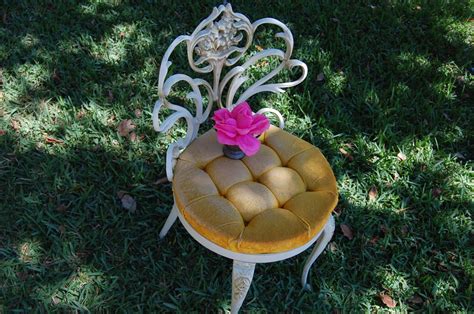 vintage gilt metal floral accent chair  yellow cushion hollywood