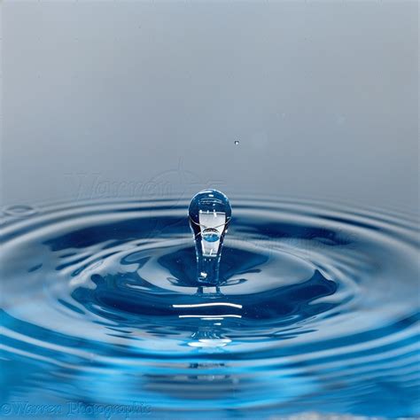 water drop strikes  surface    pool photo wp