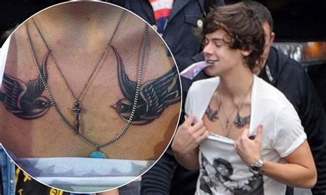 harry styles shows off new body art after visiting david beckham s