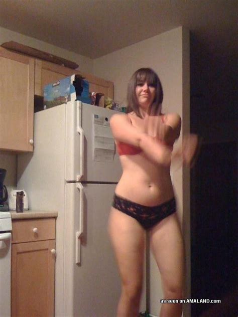 horny amateur milf stripping naked in the kitchen pichunter