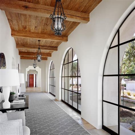 large steel windows illuminate  romantic stretch  hallway  highlight  great view