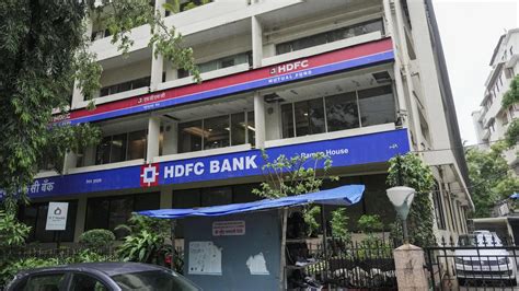 hdfc bank completes merger formalities rebrands hdfc  offices