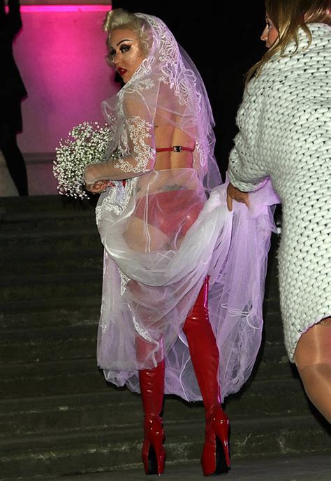 Brooke Candy Flashes Pants In Completely See Through Wedding Dress