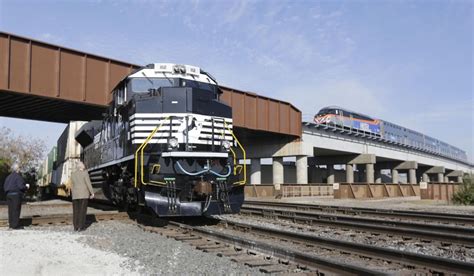 A Metra Train Sits On The New Englewood Flyover Bridge That Replaces A