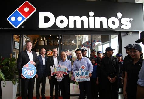 dominos opens  store worldwide
