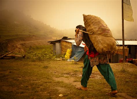 carrying  heavy sack  potatoes   indigenous peo flickr
