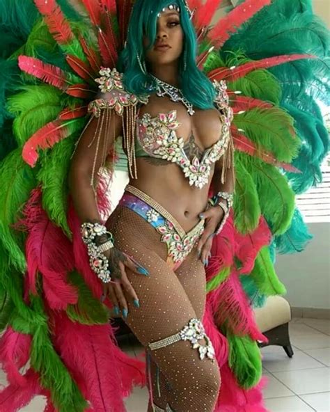 rihanna shows off her amazing figure in very sexy bejewelled bikini and feathers at crop over