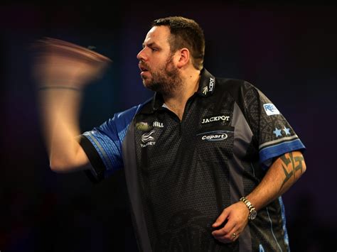 pdc world darts championships adrian lewis eases     win  ted evetts