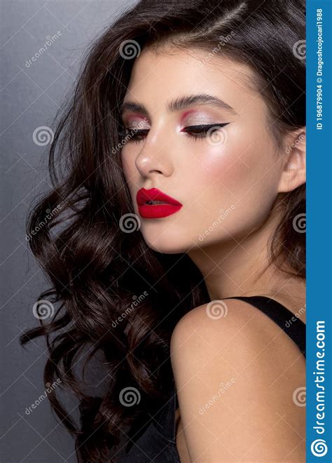 closeup pportrait sensual beautiful woman make up curly hair style