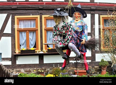 Two Witch Doll Adorn A Building In Stolberg Harz Germany 23 April
