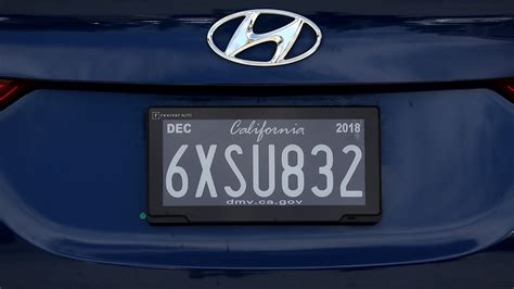 digital license plates roll   california texas public radio