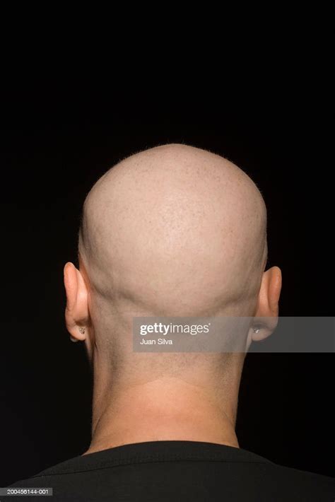 Mature Woman With Shaved Head Closeup Rear View Photo Getty Images