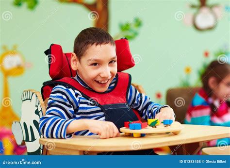 portrait  cheerful boy  disability  rehabilitation center