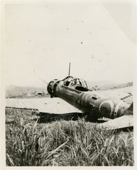 damaged japanese dive bomber   unknown location  digital