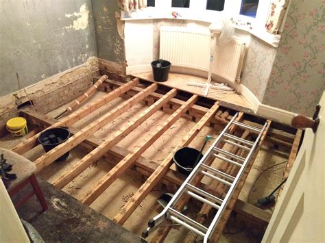 replace rotten floor joists  insulate  suspended wooden floor   house