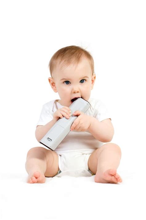 baby met afstandsbediening stock foto image  achtergrond