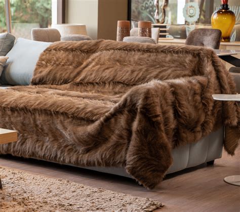 neutral tone sable fur blanket  real fur coats haute acorn