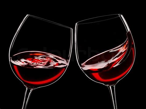 two glasses of red wine isolated over stock image colourbox