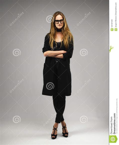 Attractive Long Legs Long Hair Model Woman Wearing Geeky Glasses Stock