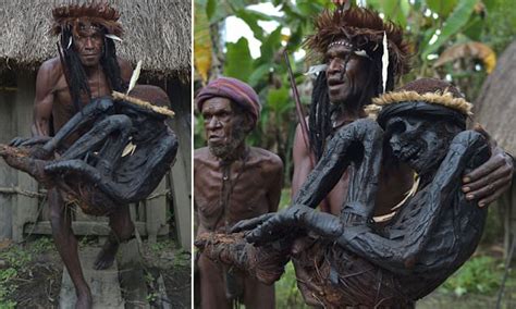 papua new guinea where villagers mummify their ancestors and keep their