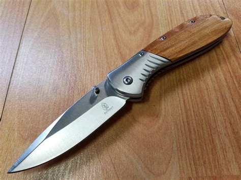 buckshot  spring assist open folding wood handle pocket knife  atlantic knife company