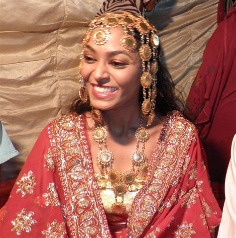 Nubian Bride Dressed In The Traditional Red And Gold