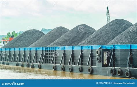 barge full  black coal cruising  mahakam river borneo indonesia stock image image