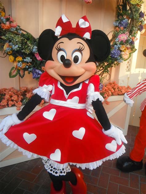 minnie mouse shows off her special valentine s dress as part of disney s limited time magic