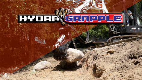 soil friends excavation  cmp hydra grapple  boulder walls carletonequipmentcom youtube