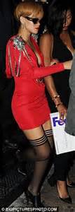 rihanna gets into the festive spirit in red dress and