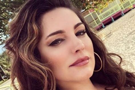 Braless Kelly Brook S Cleavage Erupts From Skintight Corset Daily Star