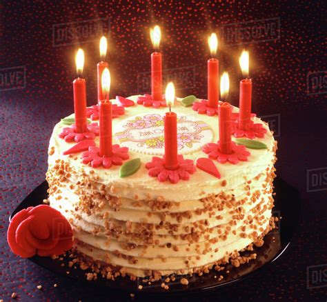 birthday cake  burning candles stock photo dissolve