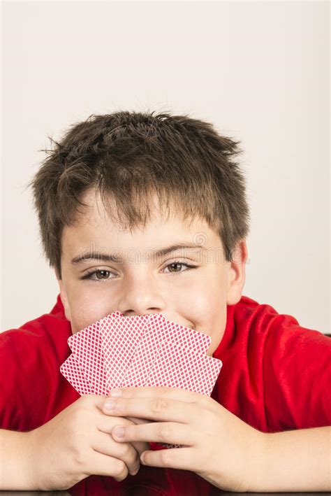 young boy playing cards stock photo image  cards intelligence